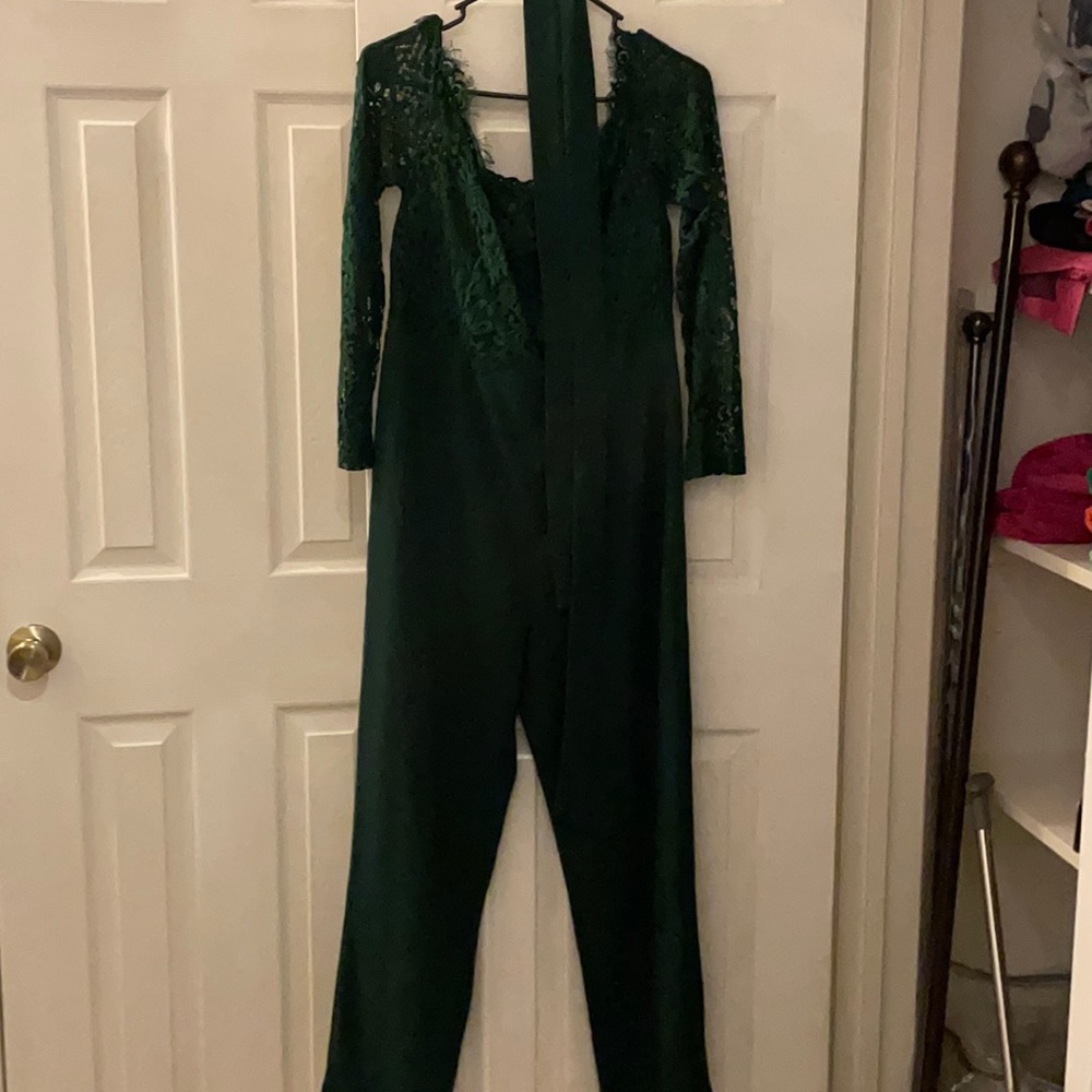 Green romper with lace trim